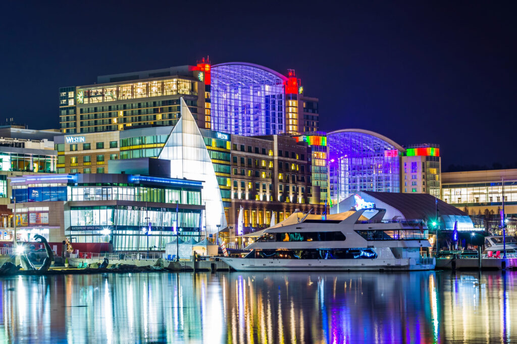 National Harbor waterfront illuminated at night in Maryland | Castine Concierge Physical Therapy | Mobile Physical Therapy Services Maryland